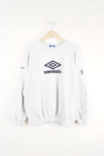 Umbro Pro Training grey crewneck sweatshirt features embroidered logo across the front and on the sleeves