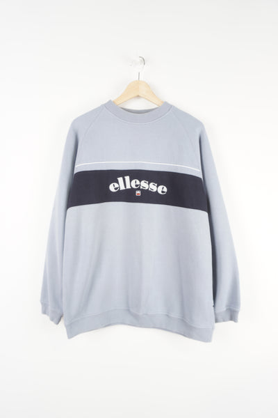 Ellesse baby blue crewneck sweatshirt features embroidered spell-out logo across the chest