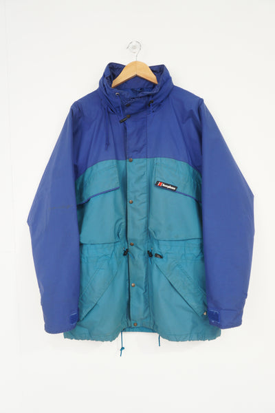 Berghaus blue gore-tex fabric Windbreaker jacket with foldaway hood and logo