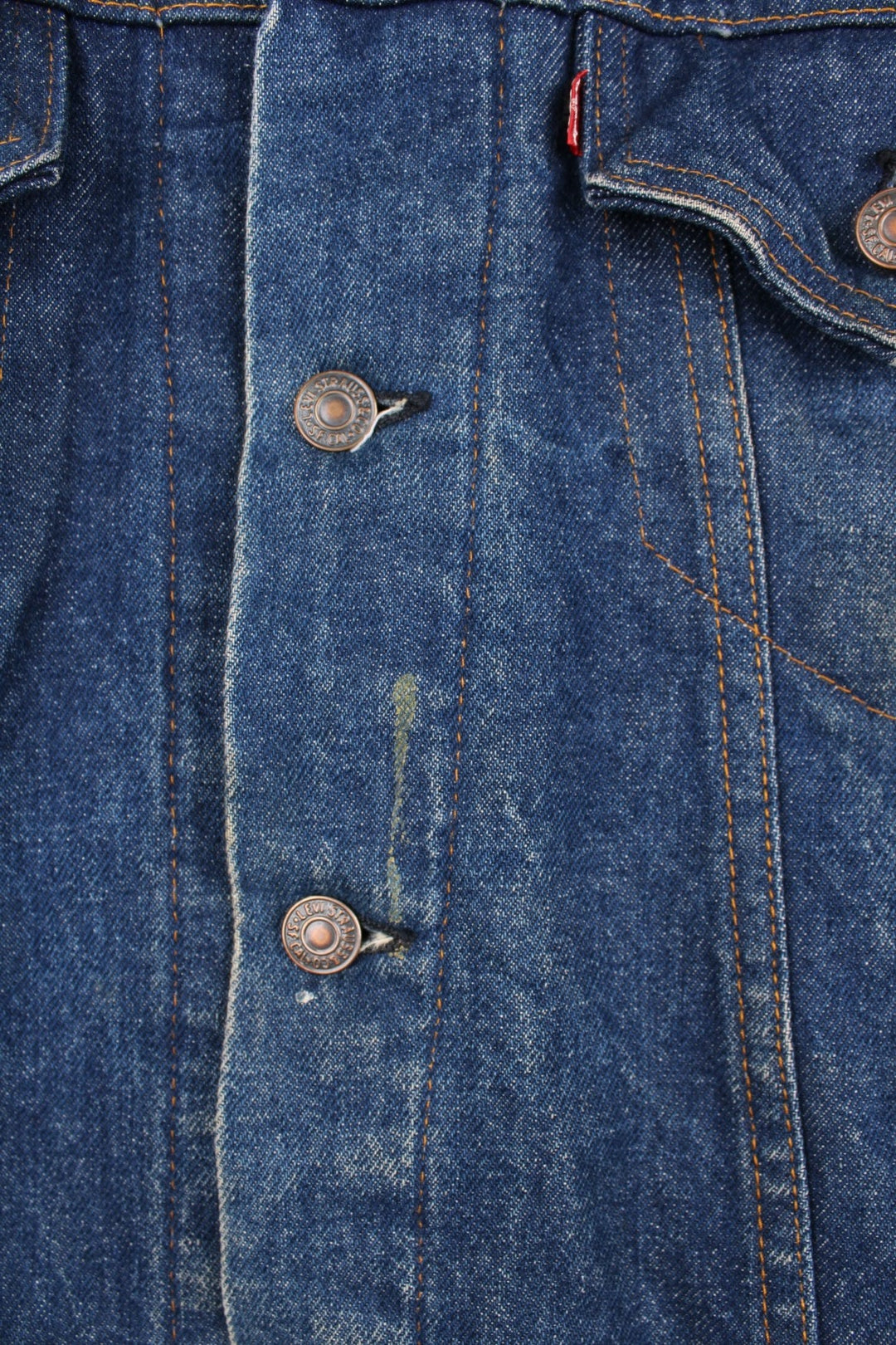 Levi's Denim Jacket in a blue colourway, button up with double chest pockets, has a blanket lining, and the logo embroidered on the front. 
