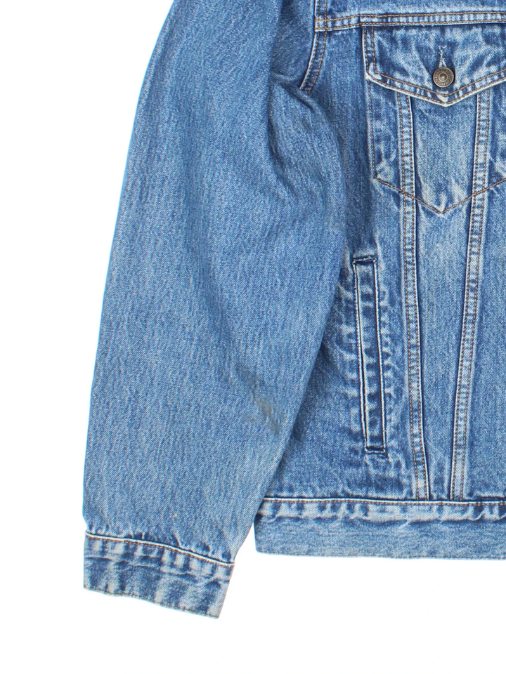Vintage Levi Strauss Denim Jacket in a blue colourway. Buttons up and has multiple pockets, and the logo tab embroidered on the front.