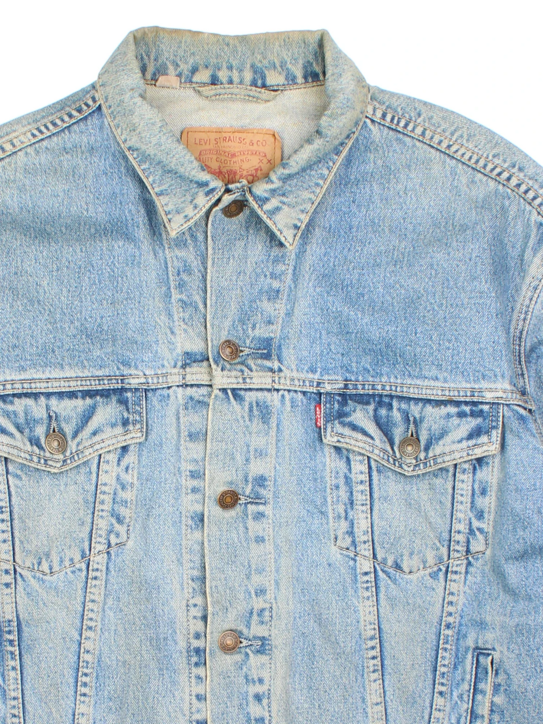 Vintage Levi Strauss Denim Jacket in a blue colourway. Buttons up and has multiple pockets, and the logo tab embroidered on the front.