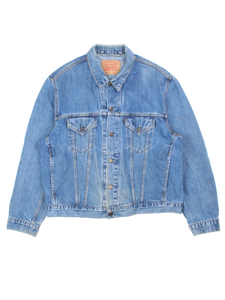 Vintage Levi Strauss Denim Jacket in a blue colourway. Buttons up and has multiple pockets, and the logo tab embroidered on the front.