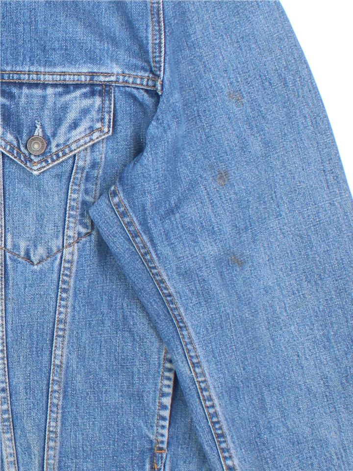 Vintage Levi Strauss Denim Jacket in a blue colourway. Buttons up and has multiple pockets, and the logo tab embroidered on the front.