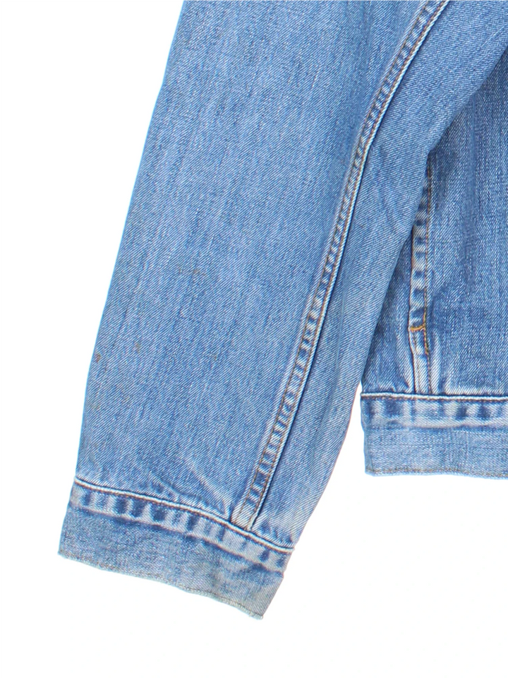Vintage Levi Strauss Denim Jacket in a blue colourway. Buttons up and has multiple pockets, and the logo tab embroidered on the front.