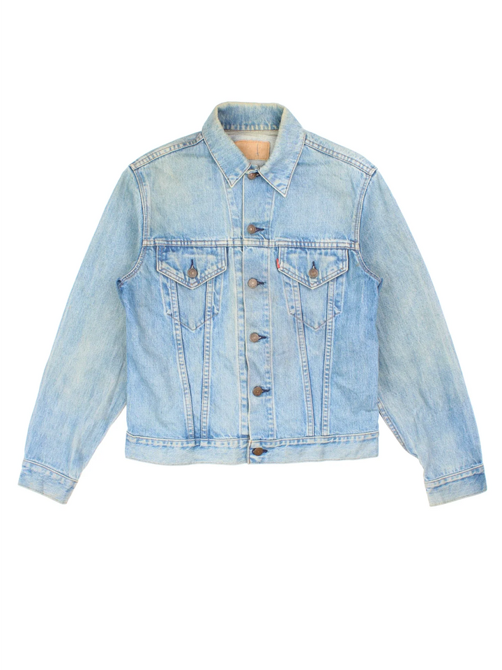 Vintage Levi Strauss Denim Jacket in a blue colourway. Buttons up and has double chest pockets, and the logo tab embroidered on the front.