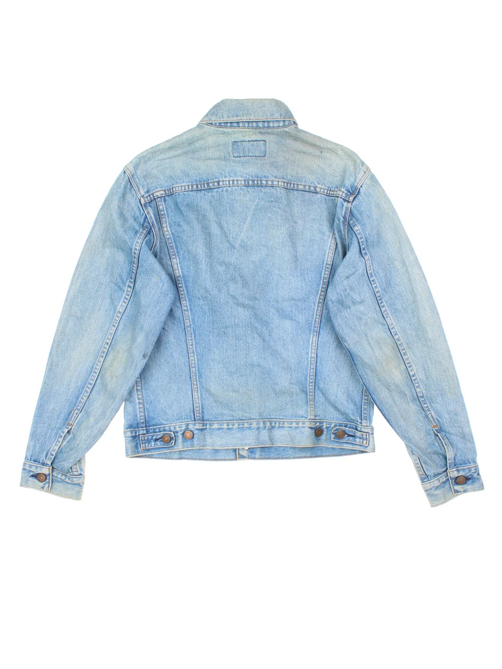 Vintage Levi Strauss Denim Jacket in a blue colourway. Buttons up and has double chest pockets, and the logo tab embroidered on the front.