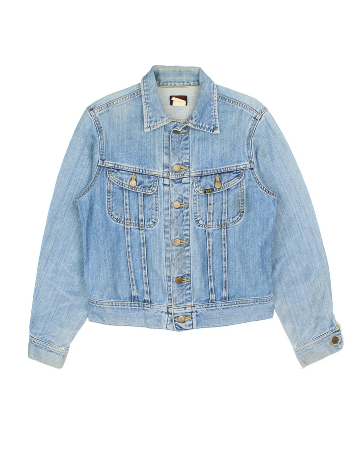 Vintage Lee Denim Jacket in a blue colourway. Buttons up and has multiple pockets, and has the logo tab embroidered on the front.