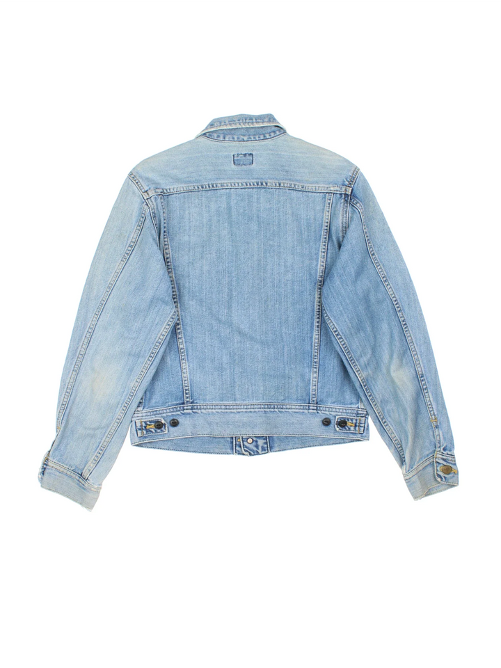 Vintage Lee Denim Jacket in a blue colourway. Buttons up and has multiple pockets, and has the logo tab embroidered on the front.