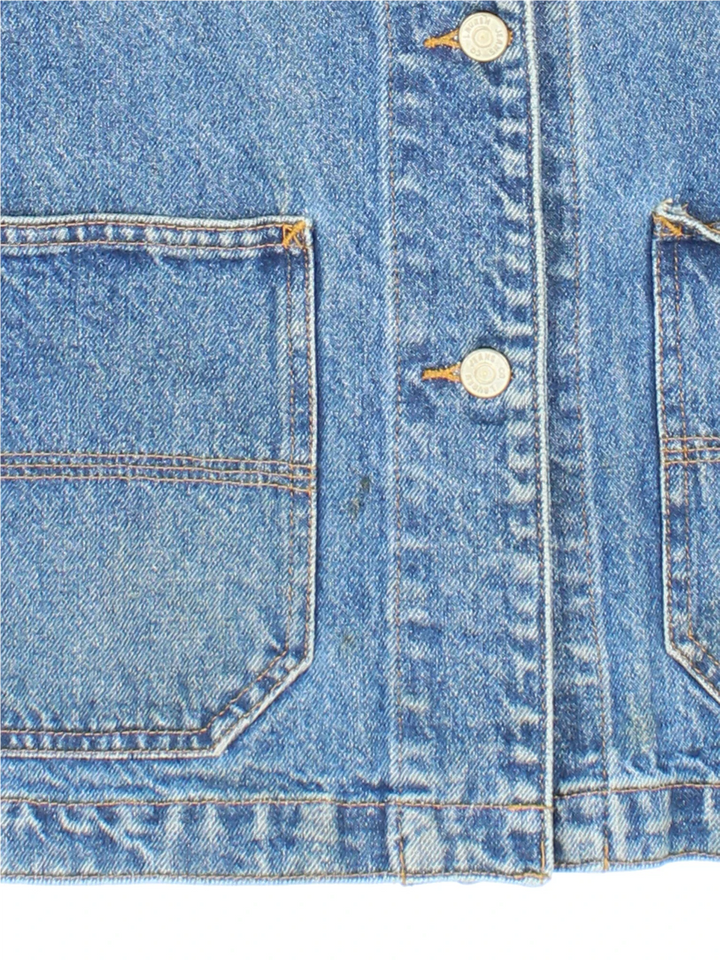 Vintage Lauren By Ralph Lauren Denim Chore Jacket in a blue colourway. Buttons up and has multiple pockets, and the logo embroidered on the front.