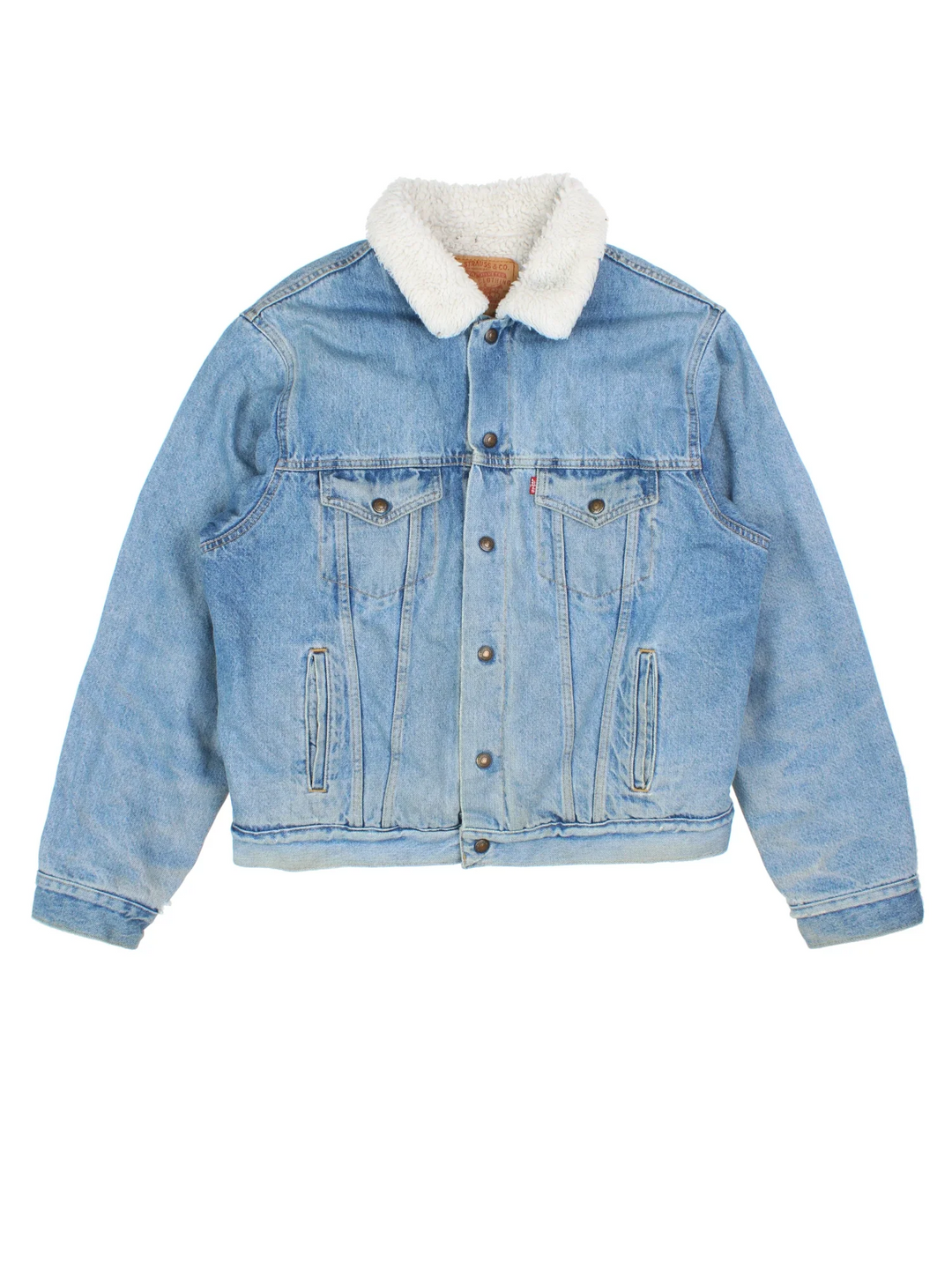 Vintage Levi Strauss Denim Sherpa Jacket in a blue colourway. Buttons up and has multiple pockets, insulated with a sherpa lining, and the logo embroidered on the front.