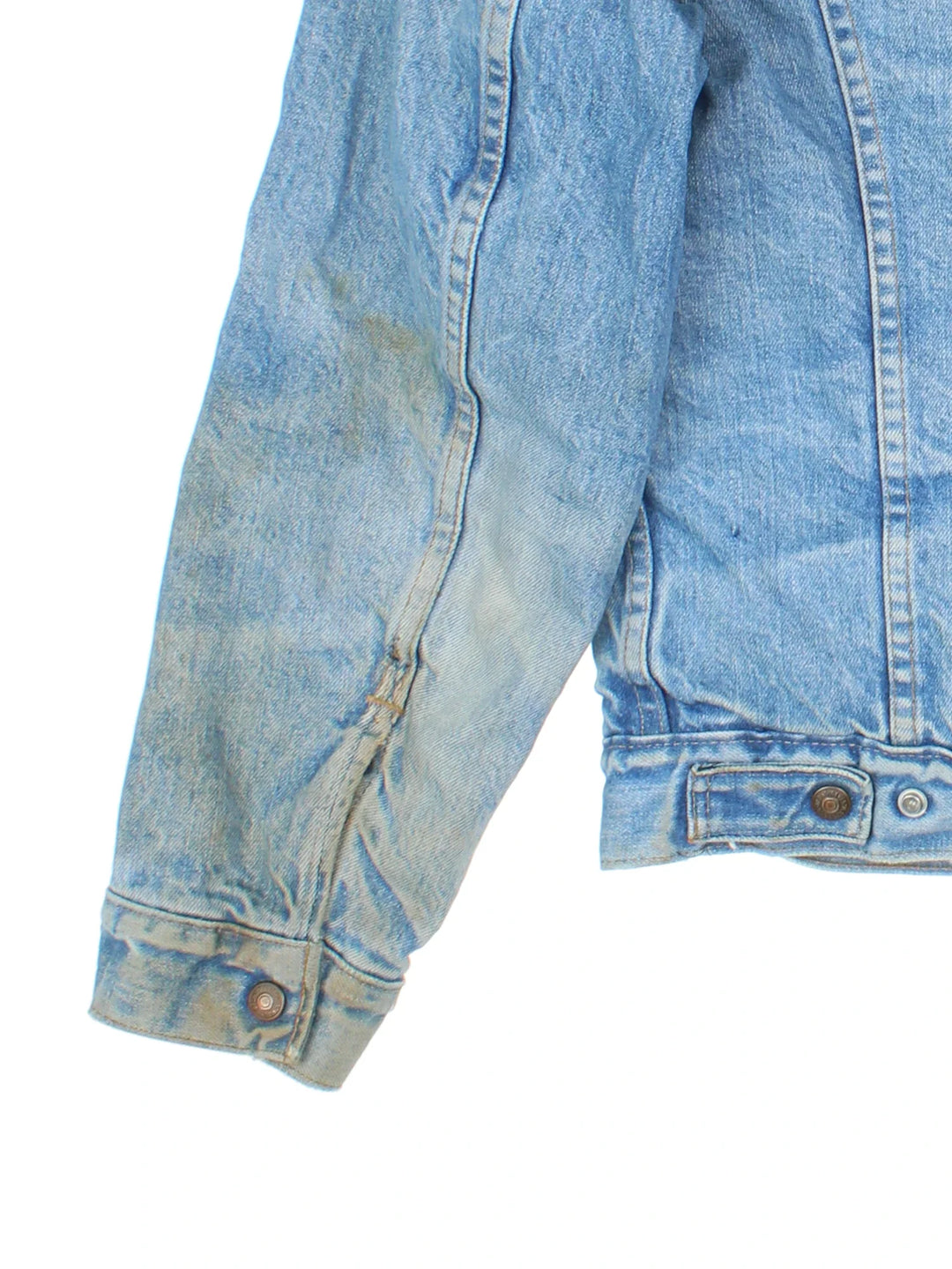 Vintage Levi Strauss Denim Sherpa Jacket in a blue colourway. Buttons up and has multiple pockets, insulated with a sherpa lining, and the logo embroidered on the front.