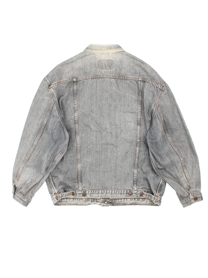 Vintage Levi Strauss Silver Tab Denim Jacket in a grey colourway. Buttons up and has multiple pockets, and the logo tab embroidered on the chest.