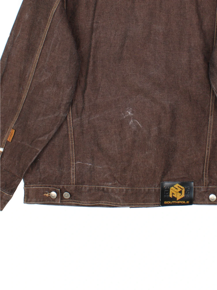 Y2K South Pole Denim Jacket in a brown colourway. Buttons up and has multiple pockets, and the logo tab embroidered on the front and back.