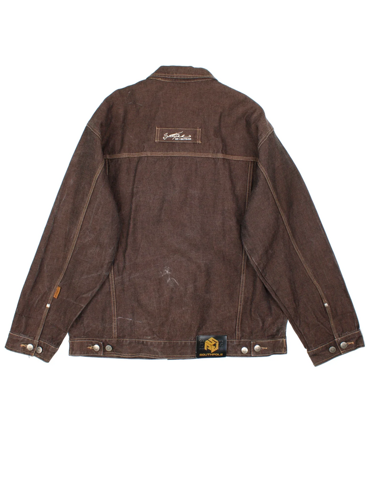 Y2K South Pole Denim Jacket in a brown colourway. Buttons up and has multiple pockets, and the logo tab embroidered on the front and back.