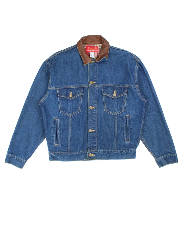 Vintage Marlboro Classics Denim Jacket in a blue colourway with brown leather collar. Buttons up and has multiple pockets.