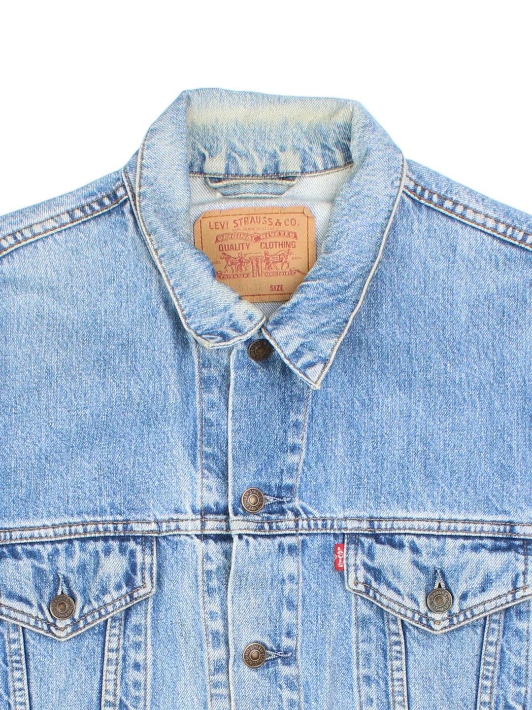 Vintage Levi Strauss Denim Jacket in a blue colourway. Buttons up and has multiple pockets, and has the logo embroidered on the front.