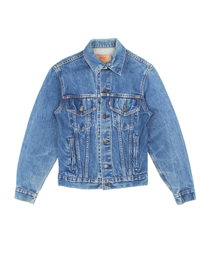 Vintage Levi Strauss Denim Jacket in a blue colourway. Buttons up and has multiple pockets, and has the logo embroidered on the front.