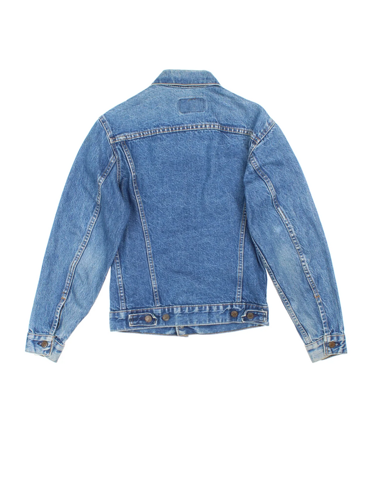 Vintage Levi Strauss Denim Jacket in a blue colourway. Buttons up and has multiple pockets, and has the logo embroidered on the front.