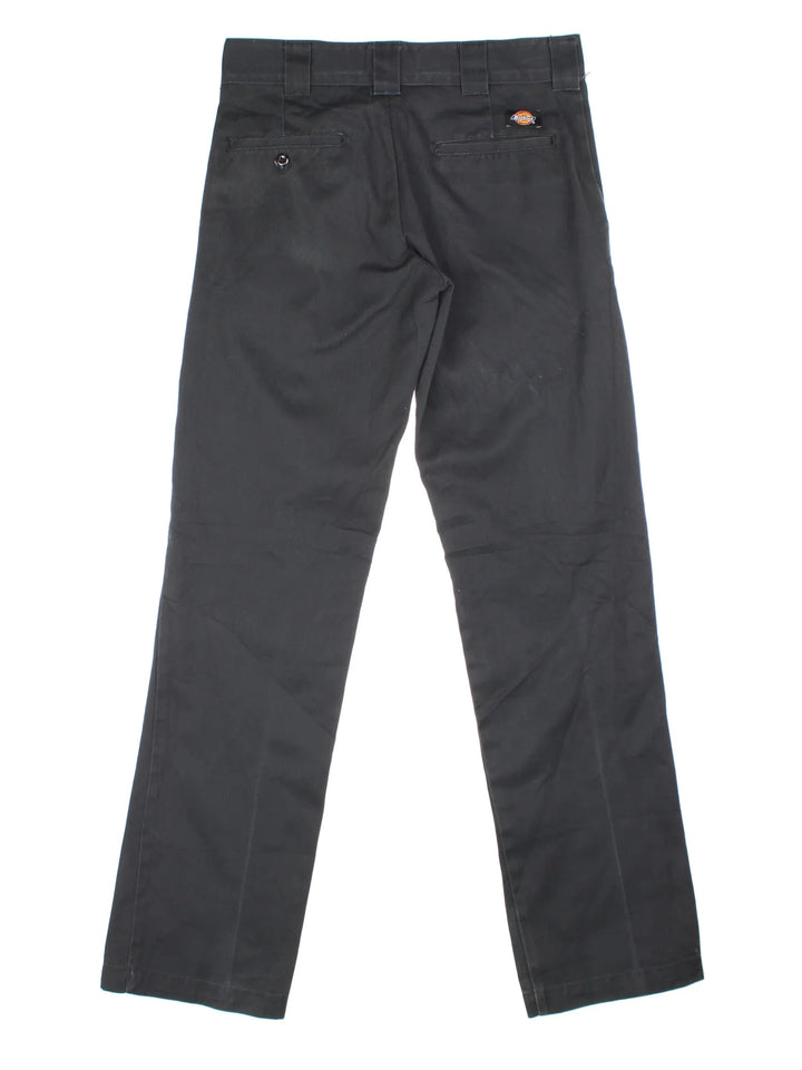 Dickies Slim Straight Leg Trousers in black colourway with pockets and the logo embroidered on the back.
