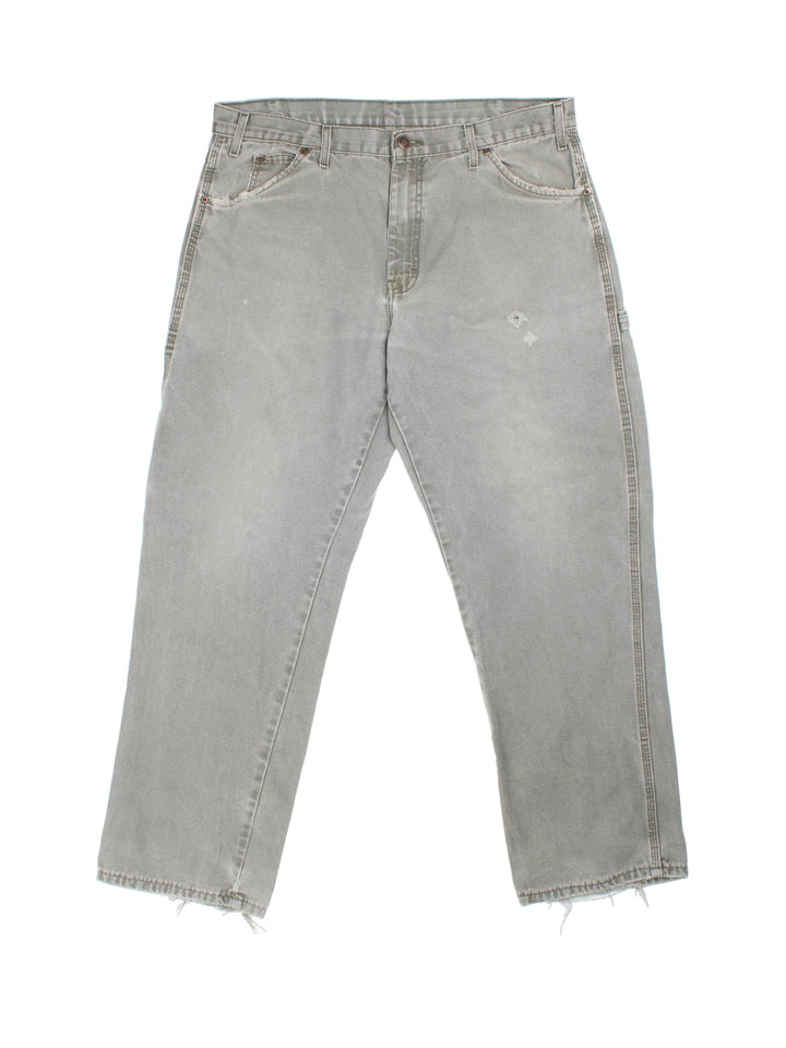 Dickies Carpenter Trousers in grey colourway with multiple pockets and the logo embroidered on the back.