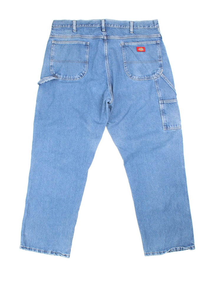 Dickies Carpenter Jeans in blue colourway with multiple pockets and the logo embroidered on the back.