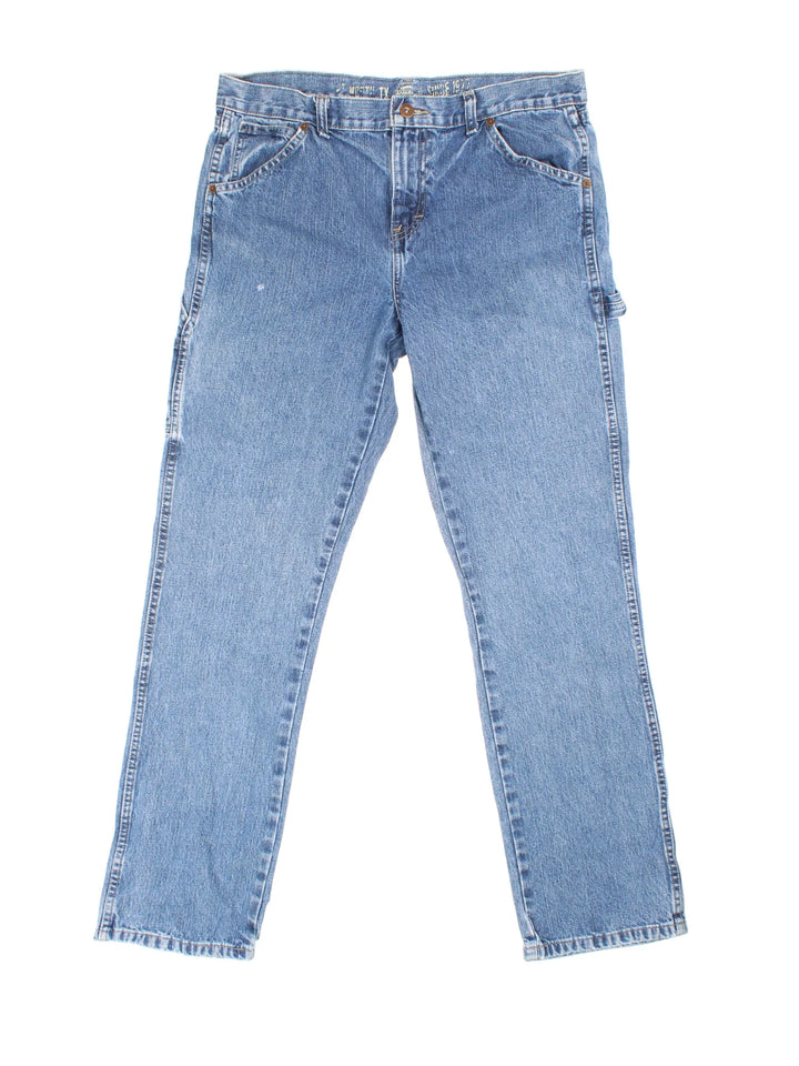 Dickies Carpenter Jeans in blue colourway with multiple pockets and the logo embroidered on the back.