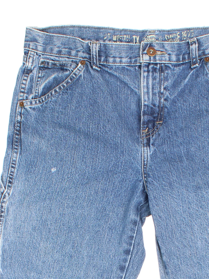 Dickies Carpenter Jeans in blue colourway with multiple pockets and the logo embroidered on the back.