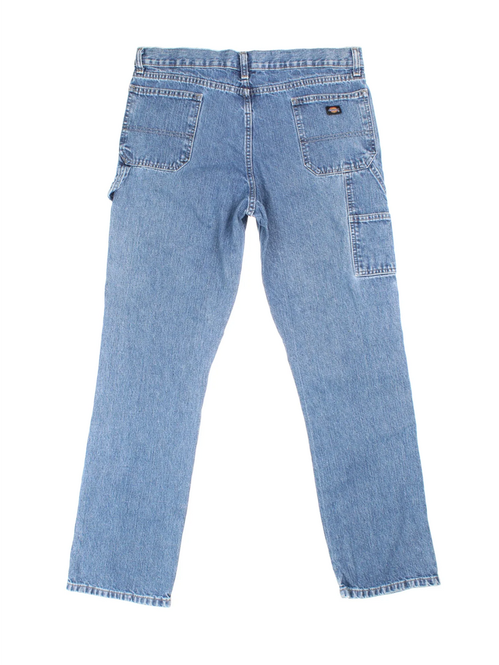 Dickies Carpenter Jeans in blue colourway with multiple pockets and the logo embroidered on the back.