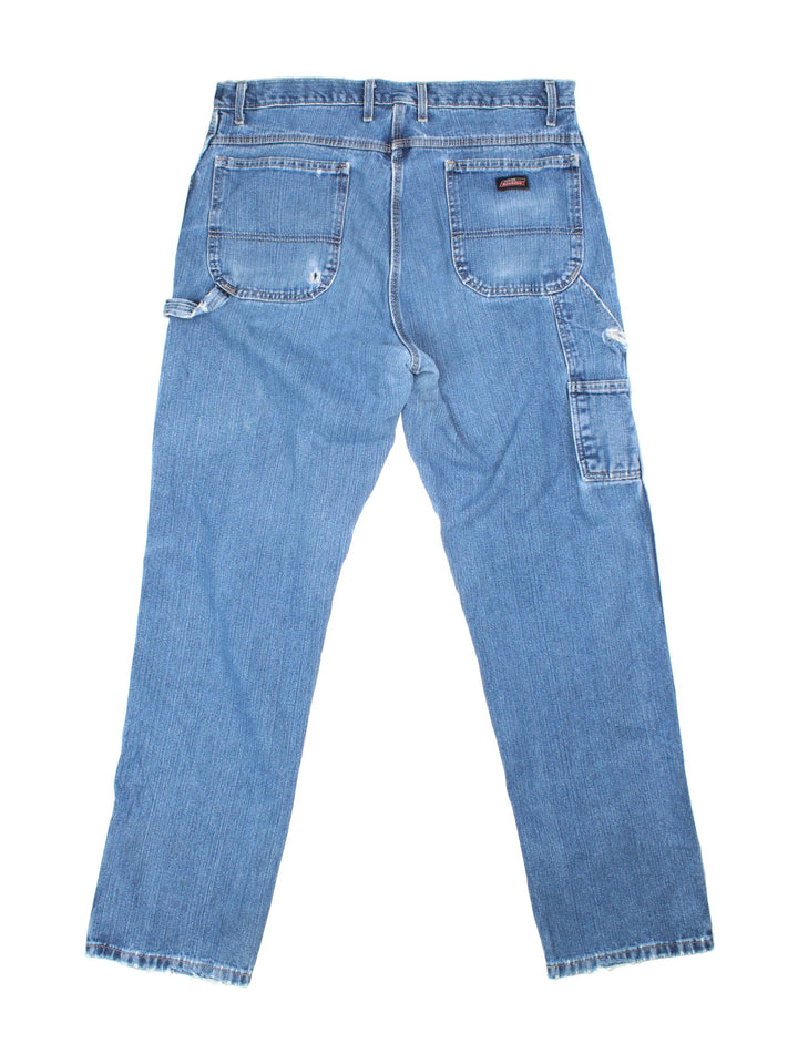 Dickies Carpenter Jeans in blue colourway with multiple pockets and the logo embroidered on the back.
