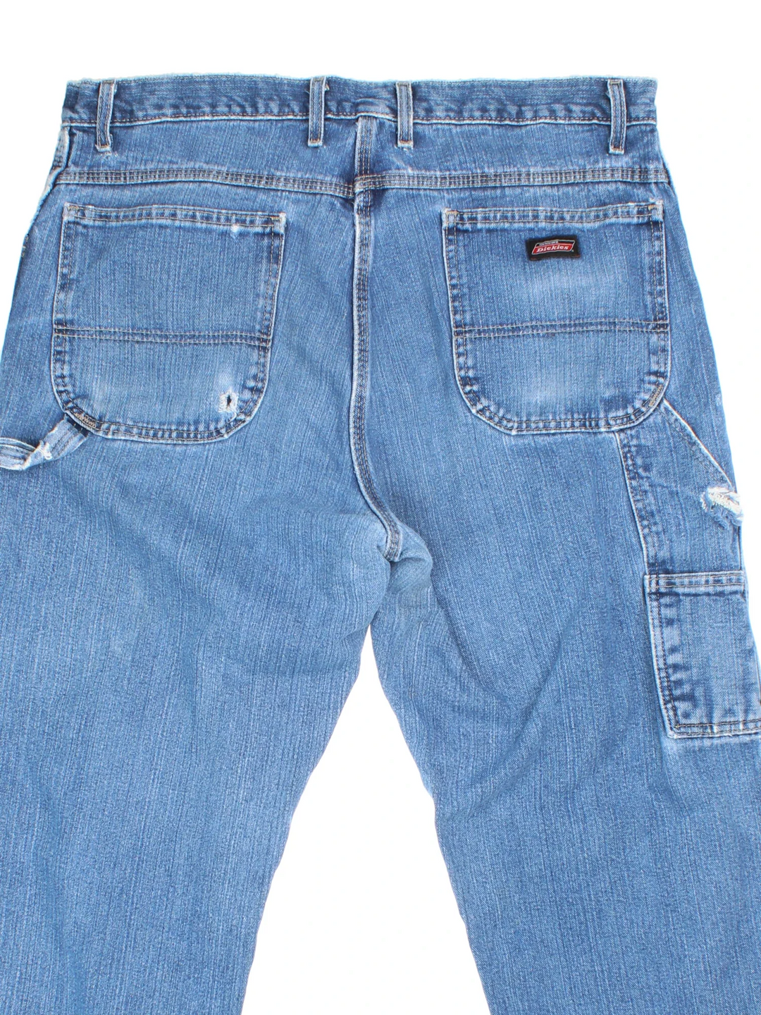 Dickies Carpenter Jeans in blue colourway with multiple pockets and the logo embroidered on the back.