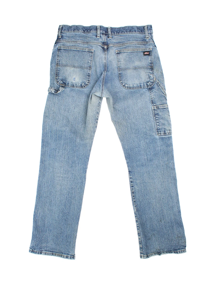 Dickies Jeans in blue colourway with multiple pockets and the logo embroidered on the back.