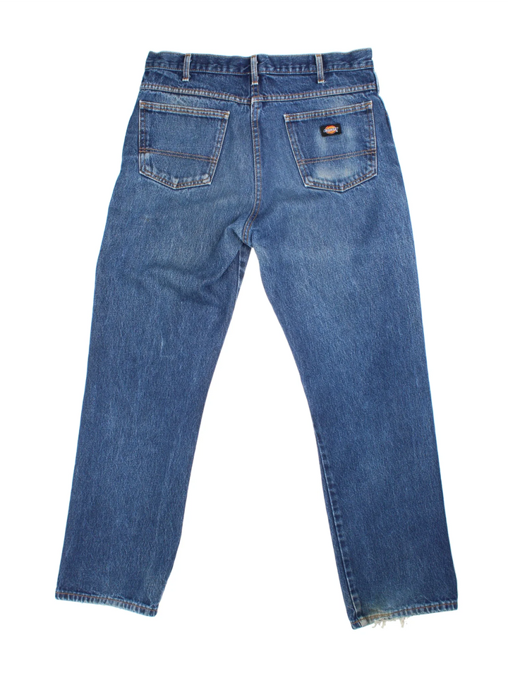 Dickies Jeans in blue colourway with multiple pockets and the logo embroidered on the back.