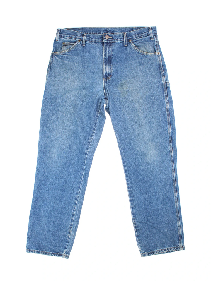 Dickies Jeans in blue colourway with multiple pockets and the logo embroidered on the back.