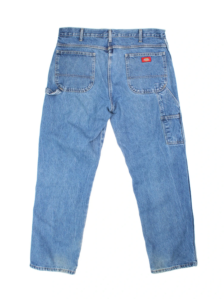 Dickies Jeans in blue colourway with multiple pockets and the logo embroidered on the back.