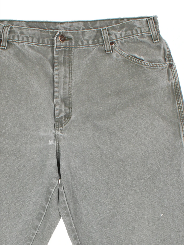 Dickies Carpenter Jeans in green colourway with multiple pockets and the logo embroidered on the back.