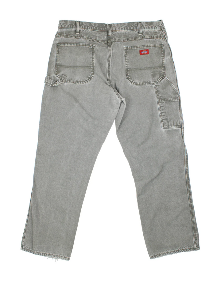 Dickies Carpenter Jeans in green colourway with multiple pockets and the logo embroidered on the back.
