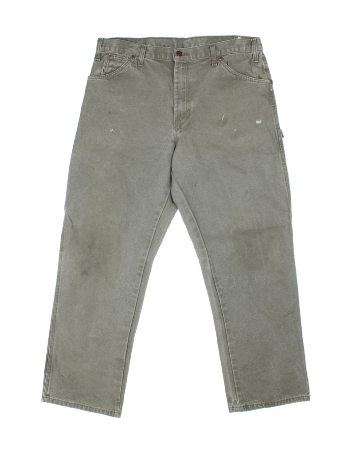 Dickies Carpenter Jeans in green colourway with multiple pockets and the logo embroidered on the back.