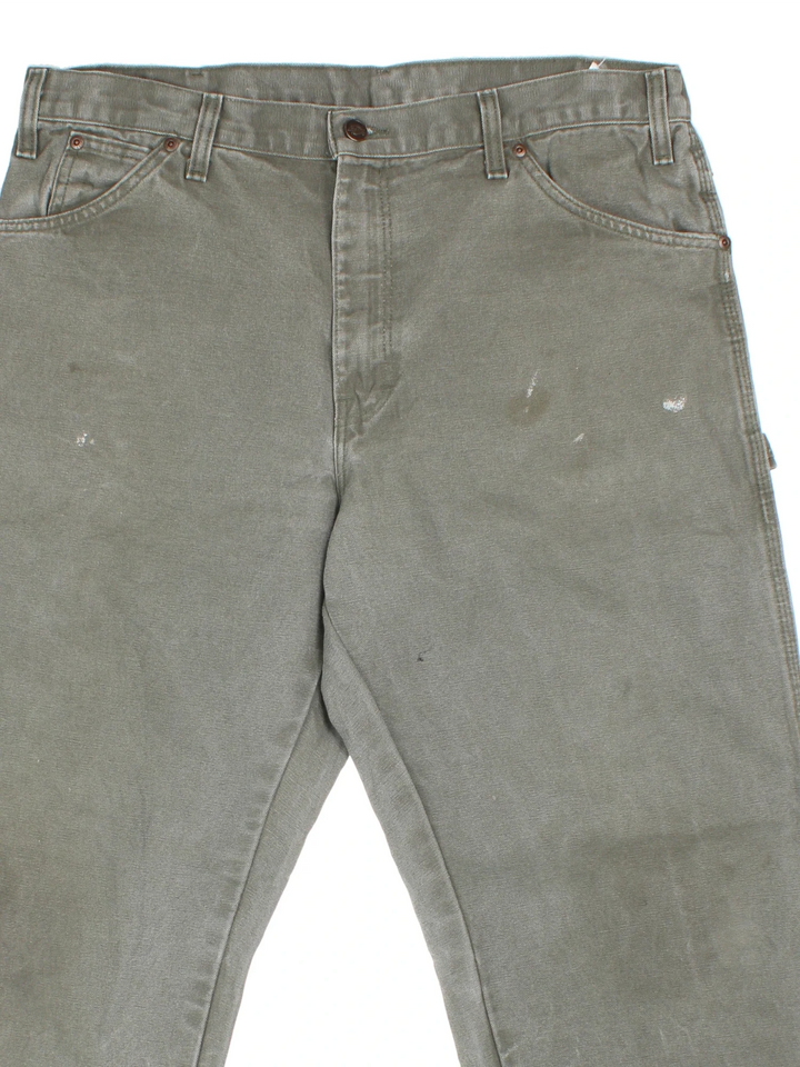 Dickies Carpenter Jeans in green colourway with multiple pockets and the logo embroidered on the back.