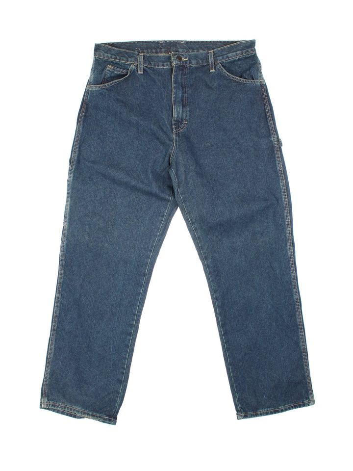 Dickies Carpenter Jeans in blue colourway with multiple pockets and the logo embroidered on the back.