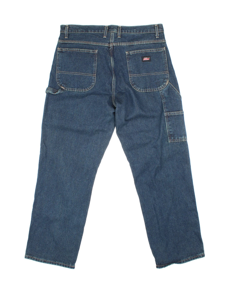 Dickies Carpenter Jeans in blue colourway with multiple pockets and the logo embroidered on the back.