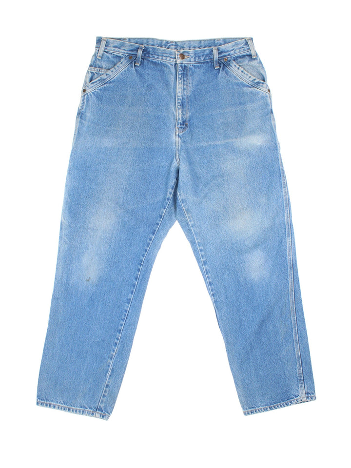 Dickies Carpenter Jeans in blue colourway with multiple pockets and the logo embroidered on the back.