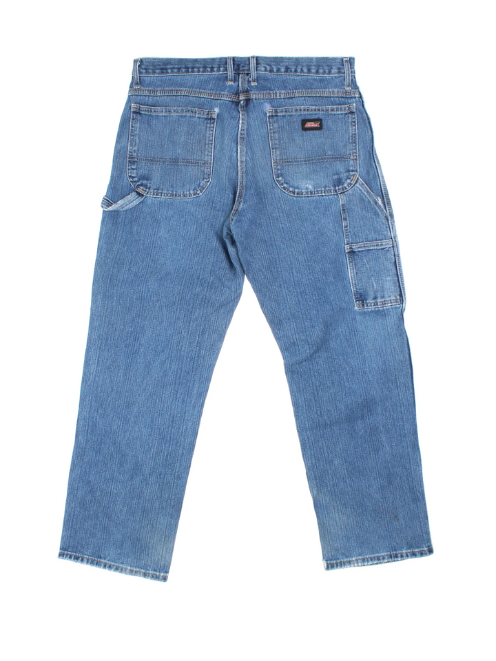 Dickies Carpenter Jeans in blue colourway with multiple pockets and the logo embroidered on the back.