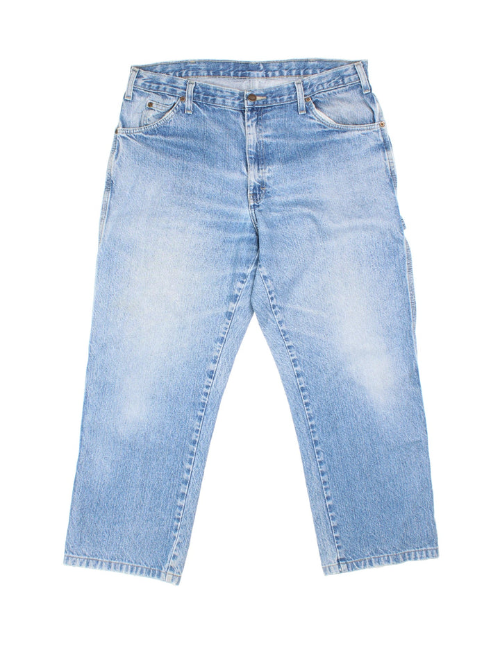 Dickies Carpenter Jeans in blue colourway with multiple pockets and the logo embroidered on the back.