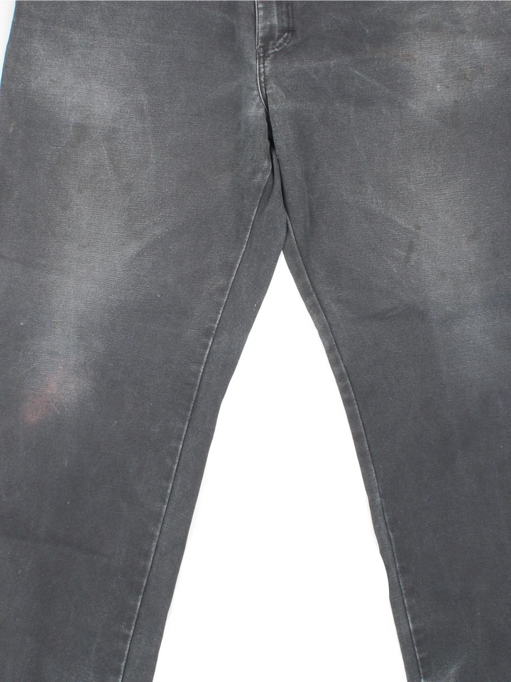 Dickies Carpenter Jeans in black colourway with multiple pockets and the logo embroidered on the back.