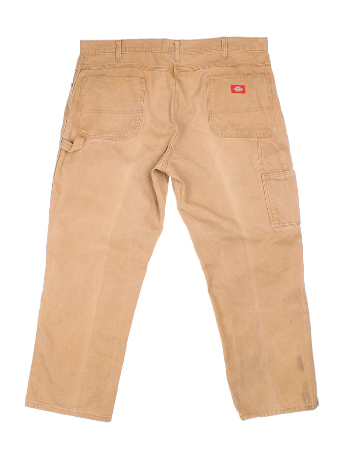 Dickies Carpenter Jeans in tan colourway with multiple pockets and the logo embroidered on the back.