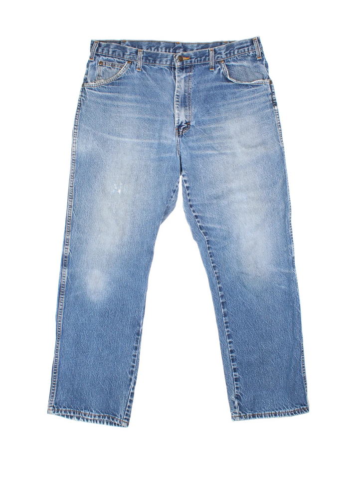 Dickies Jeans in blue colourway with multiple pockets and the logo embroidered on the back.
