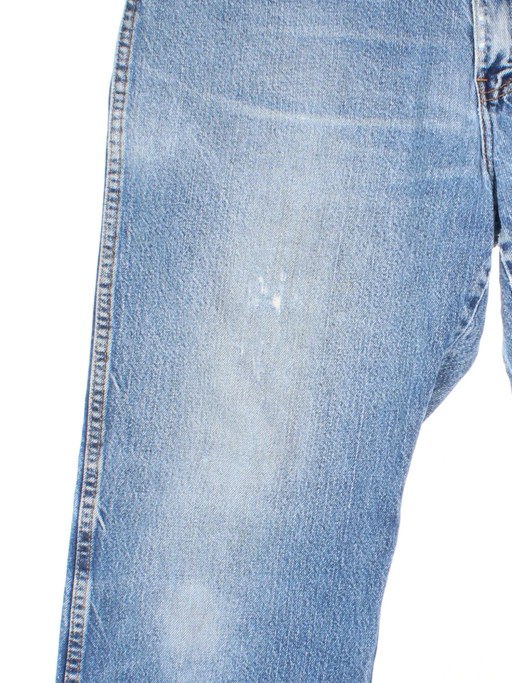 Dickies Jeans in blue colourway with multiple pockets and the logo embroidered on the back.
