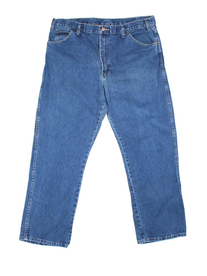 Dickies Jeans in blue colourway with multiple pockets and the logo embroidered on the back.