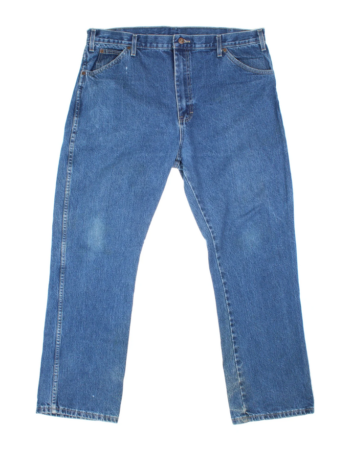 Dickies Jeans in blue colourway with multiple pockets and the logo embroidered on the back.